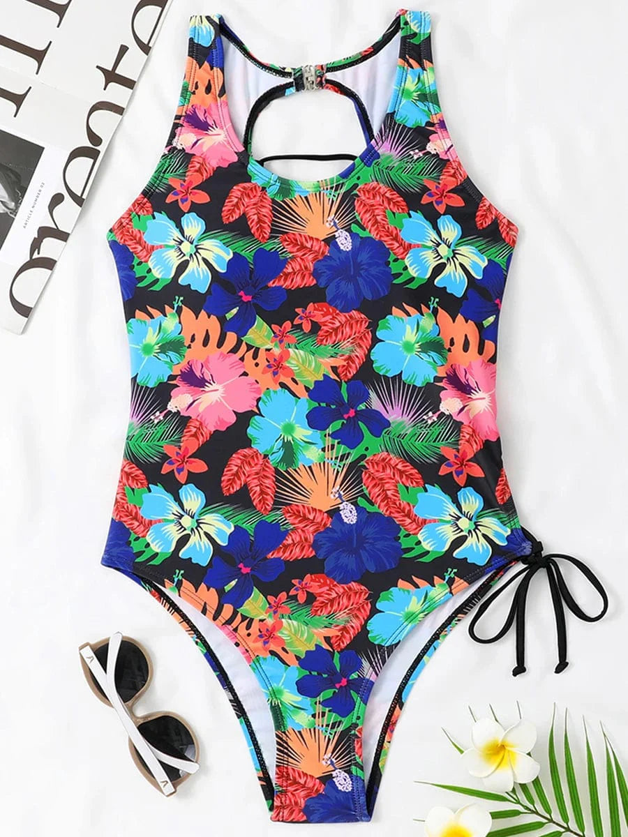 Chic Showlu Fashion women's lace-up backless printed one-piece swimsuit with a stylish design and vibrant pattern.