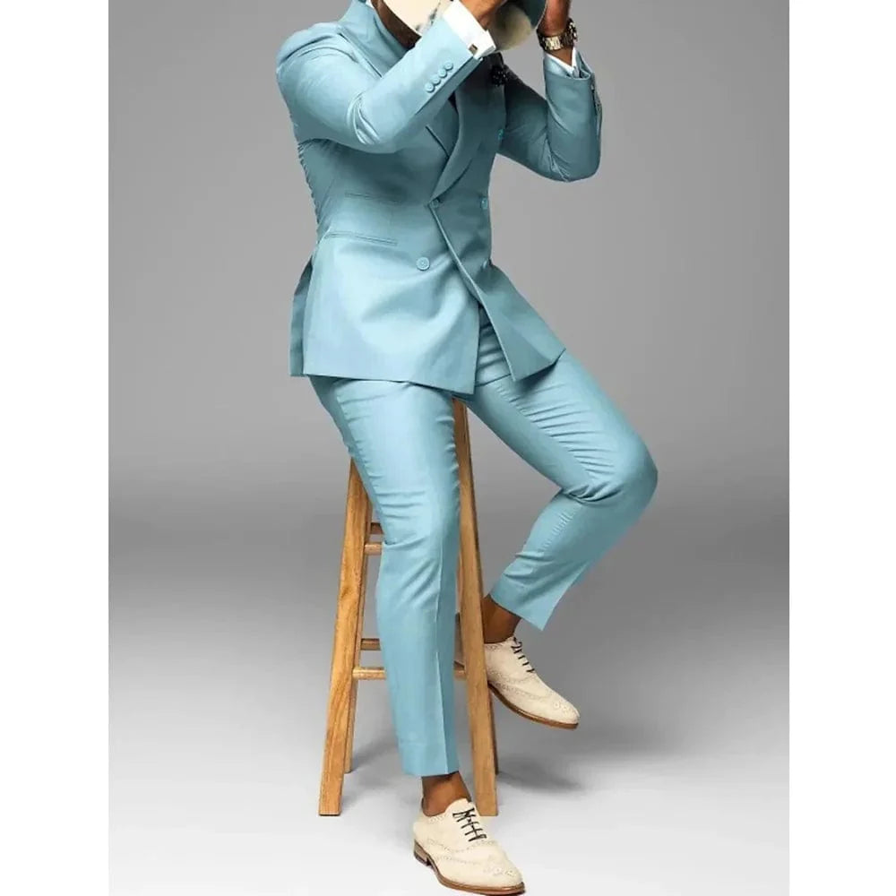 Men's slim fit double-breasted wedding suit by Showlu Fashion, featuring a chic solid design, peak lapel blazer and matching pants.