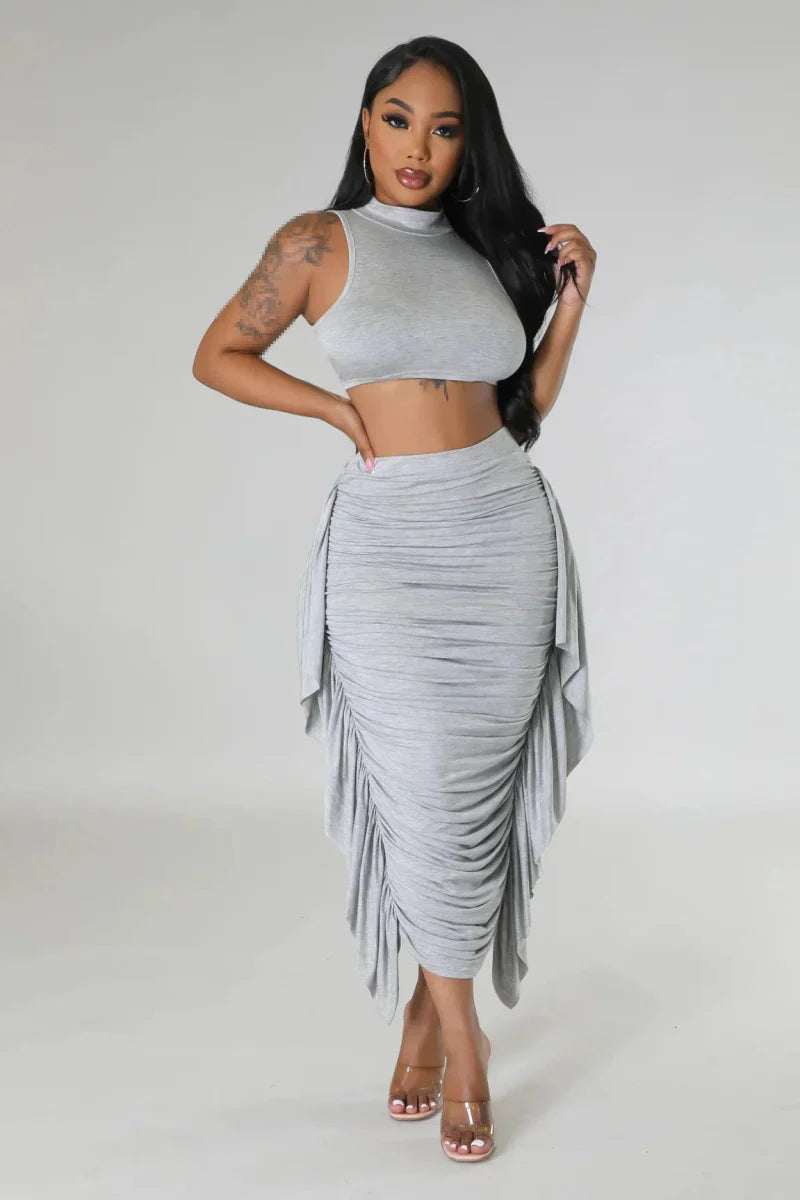 Chic women's two-piece summer outfit with a stylish top and skirt set from Showlu Fashion, perfect for warm weather.