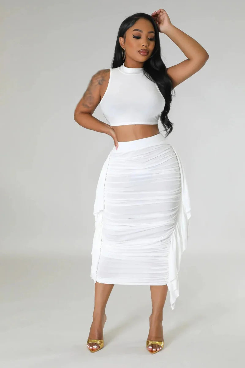 Chic women's two-piece summer outfit by Showlu Fashion, featuring a stylish top and matching skirt set for warm weather.