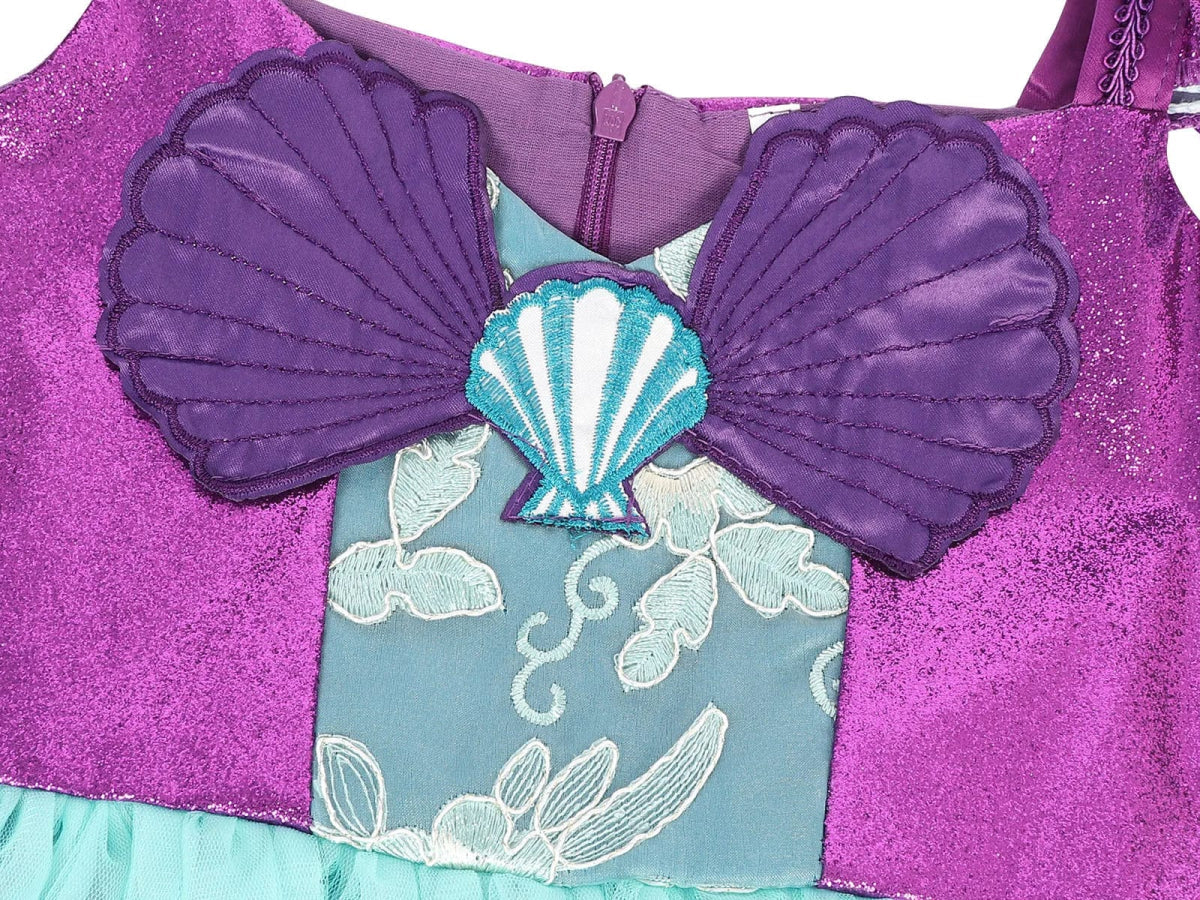 Little Girl wearing Showlu Little Mermaid Princess Costume with tutu dress, perfect for Halloween, Easter, or costume parties.