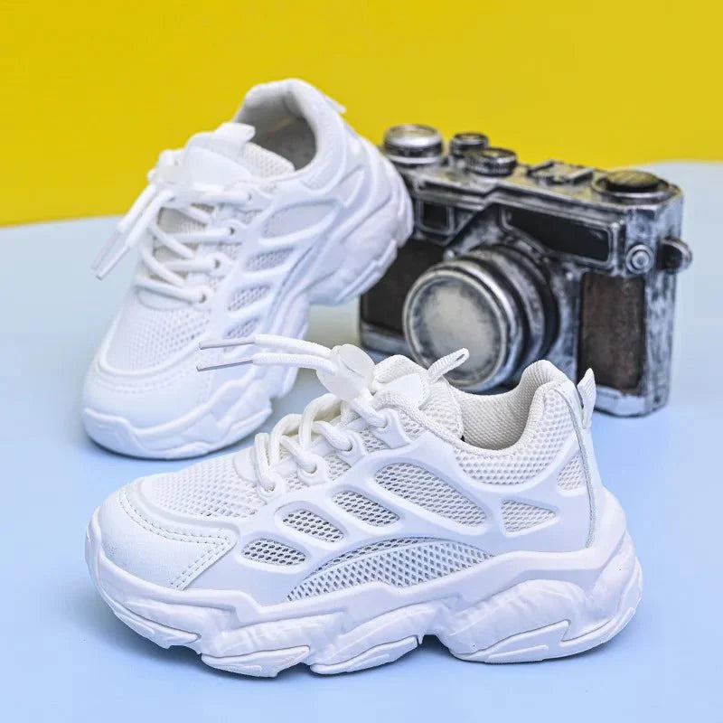 Kids breathable mesh sneakers by SHOWLU, featuring anti-slip soft bottoms, ideal for boys and girls casual wear.
