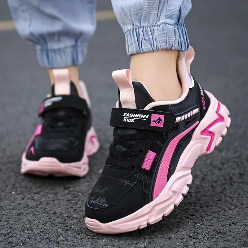 Pink leather girls' sneakers by SHOWLU FASHION STORE, breathable kids' running shoes with comfortable flat soles and sporty design.