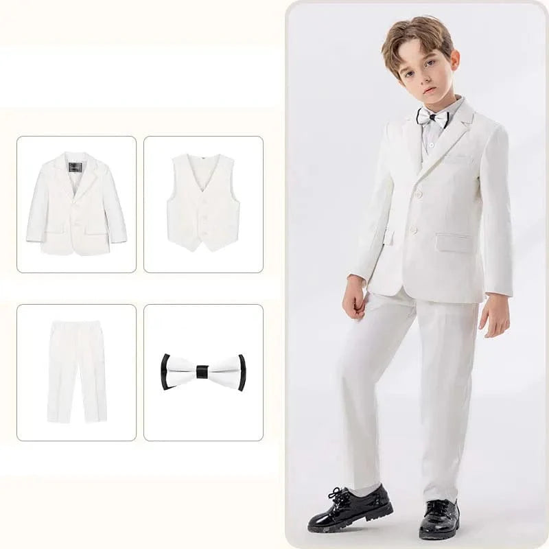 Children's white formal suit by Showlu Fashion with jacket, vest, pants, and bowtie, perfect for baptism, ceremonies, or performances.