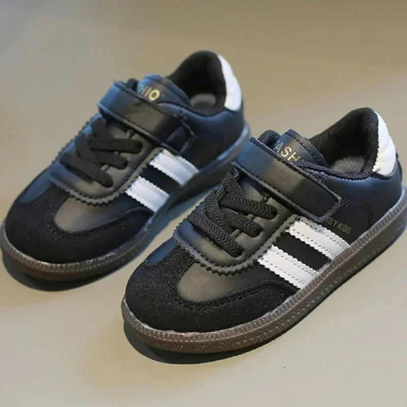 Lightweight girls' and boys' SHOWLU Kids running sneakers with non-slip PU leather soles, ideal for spring and autumn.