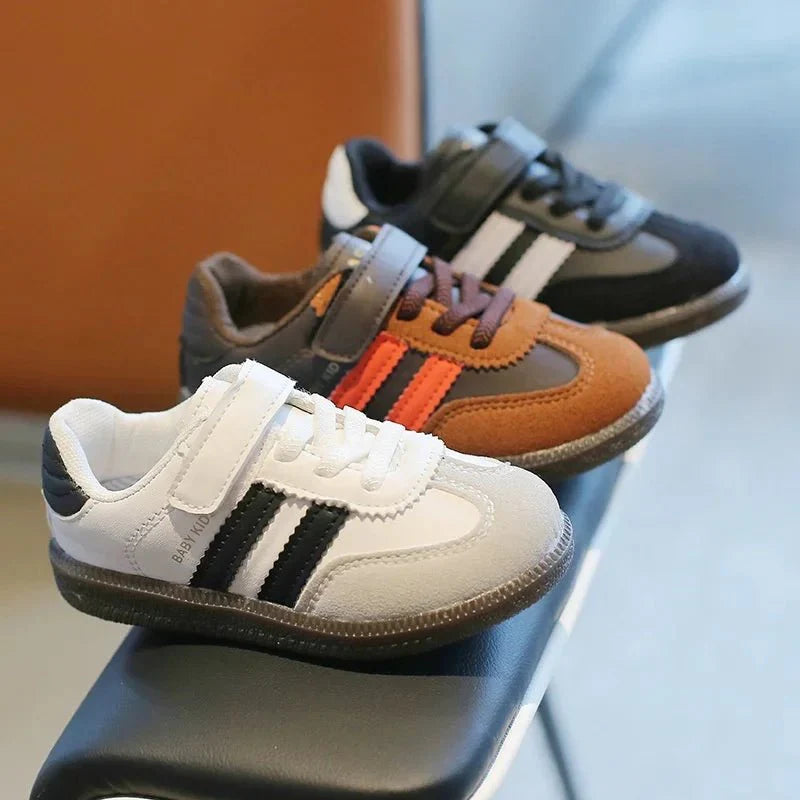 Lightweight SHOWLU Kids running sneakers with non-slip PU leather, suitable for girls and boys, perfect for spring and autumn.