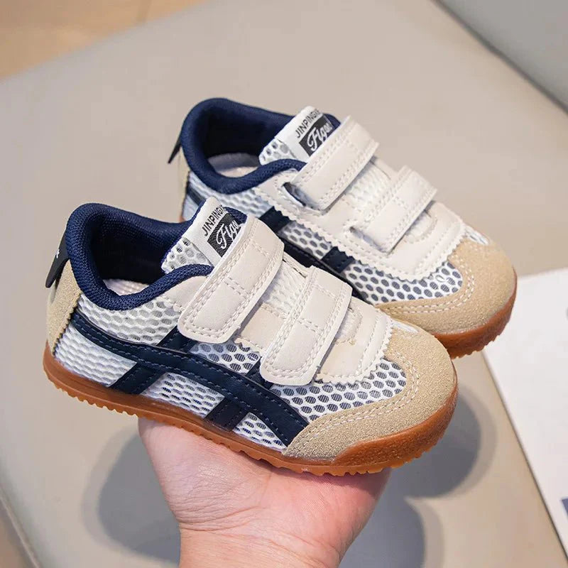 Unisex Shijunyi Kids Running Shoes with breathable mesh, non-slip sole, soft interior, ideal for school and sports activities.
