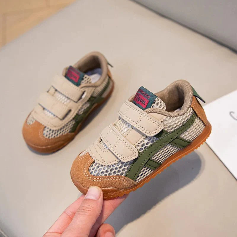 Unisex Shijunyi Kids Running Shoes by SHOWLU FASHION STORE, breathable mesh sneakers with soft soles for boys and girls.