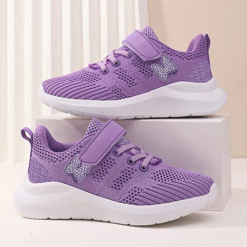 Girls' breathable mesh running shoes by Showlu Fashion with anti-slip soles, designed for outdoor sports and casual wear.
