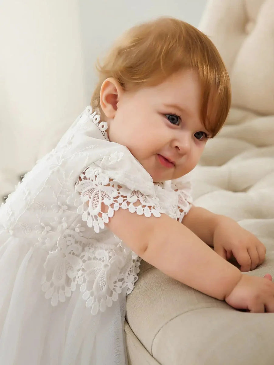 Baby girl lace christening gown with short sleeves, perfect as a birthday or special occasion dress for 3-month-old girls.