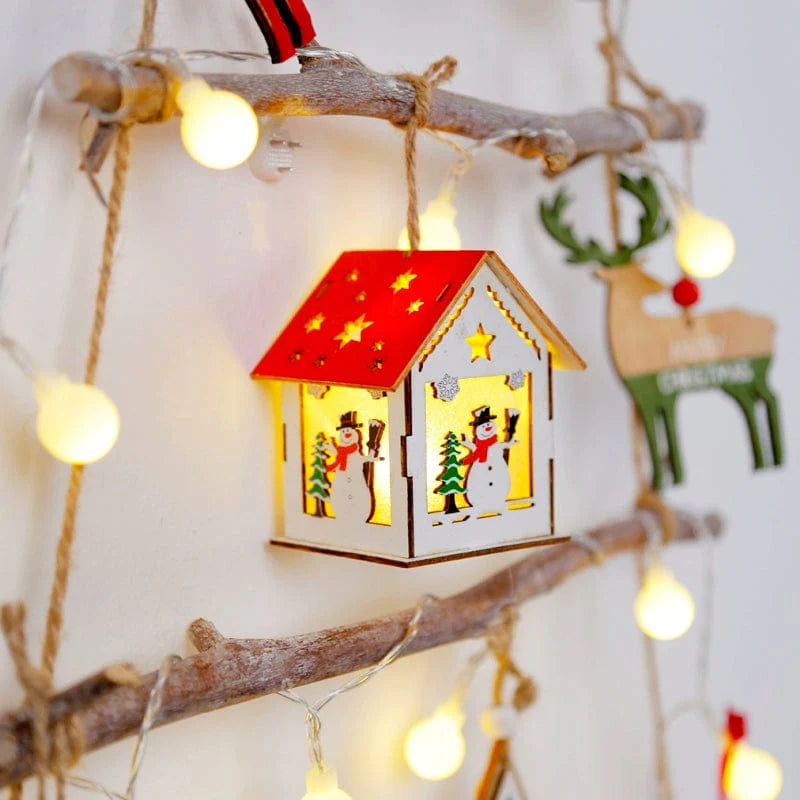 Handmade wooden ladder Christmas tree DIY ornament with holiday decorations, displayed in a festive scene.