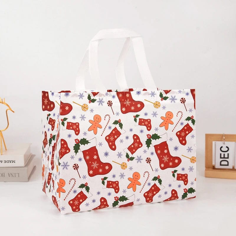 Non-woven Christmas gift bag featuring Santa Claus and snowman design, ideal for holiday candy packaging and festive gifting.