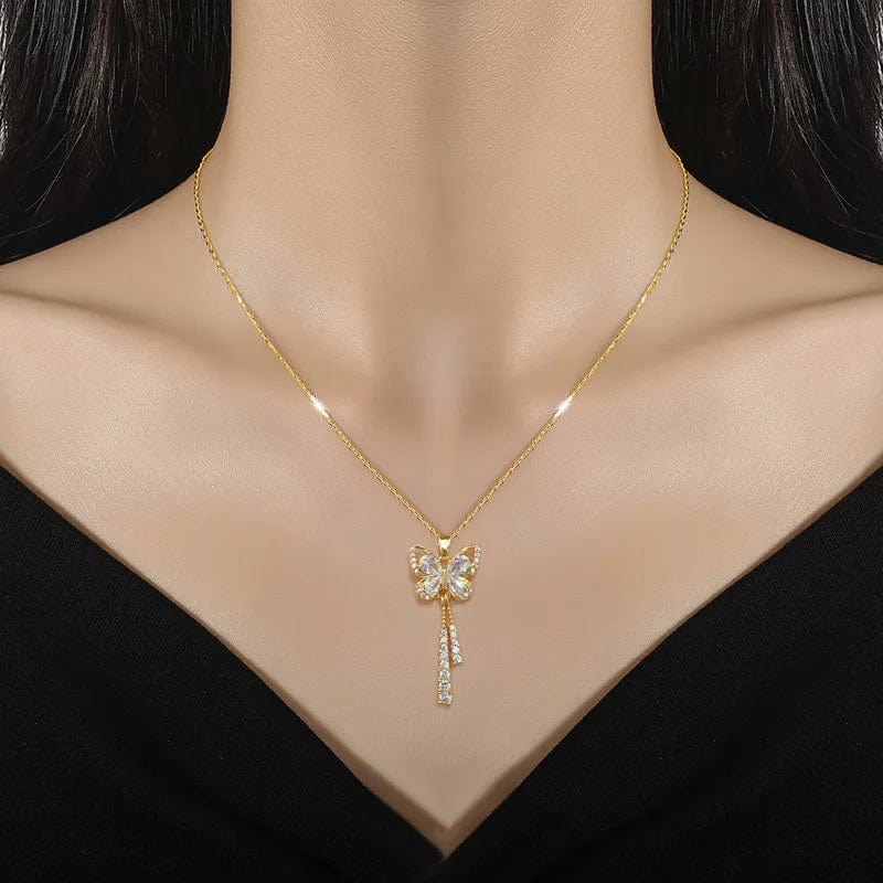Showlu White Tassel Butterfly Necklace with stainless steel chain, featuring a charming white tassel and butterfly pendant for versatile fashion.