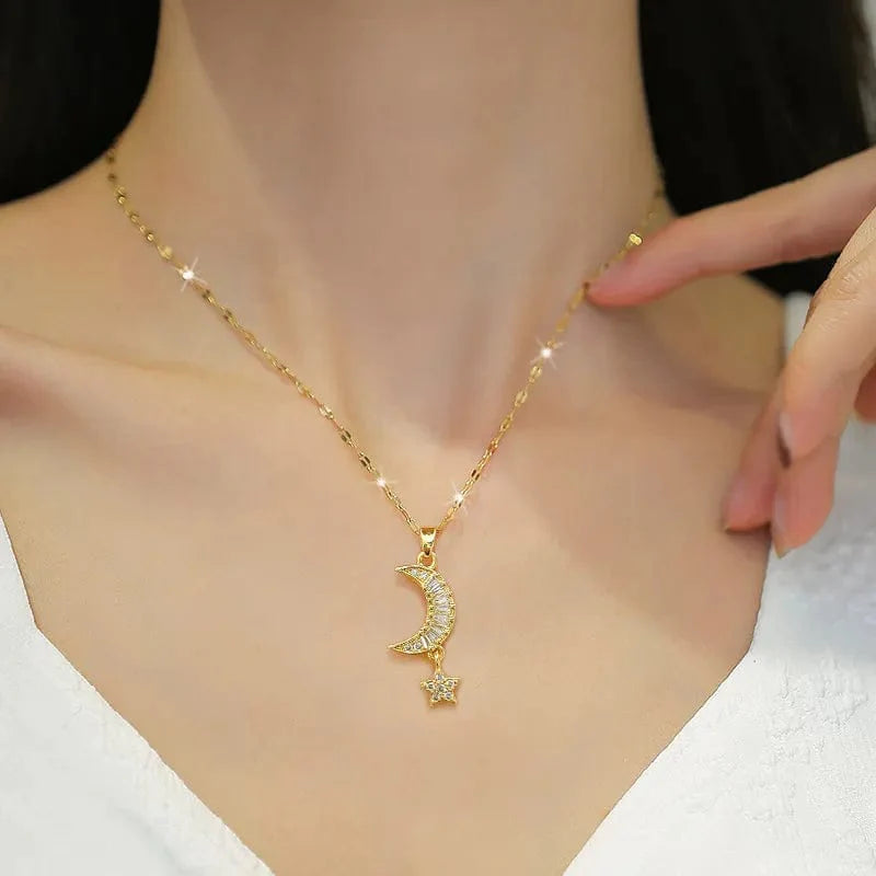 Showlu Star Moon Necklace with stainless steel snake chain, featuring a delicate star and moon pendant, stylish clavicle jewelry.