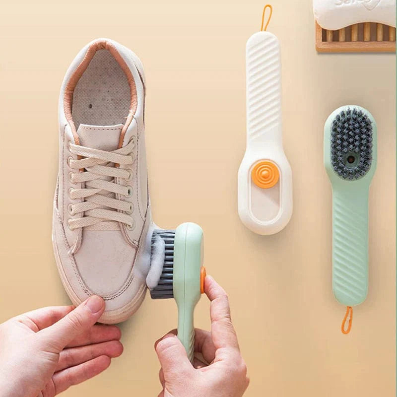 Showlu Soft Bristle Liquid Shoe Brush with long handle for cleaning shoes, clothes, and household surfaces.
