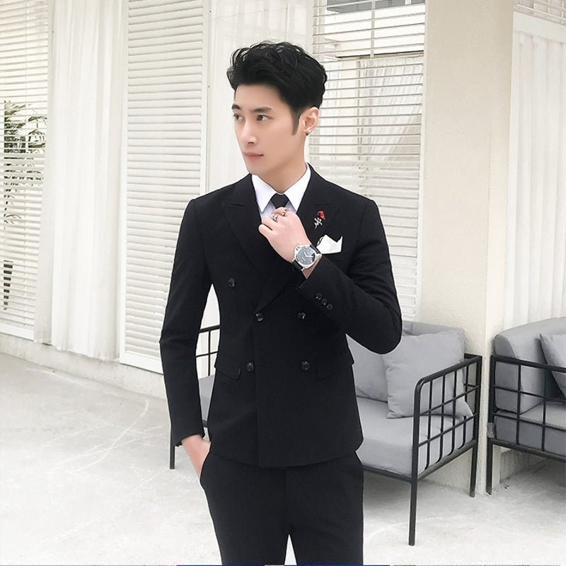 Slim-fit men's three-piece wedding suit in a casual Korean style, featuring a jacket, vest, and trousers, worn by a handsome groom.