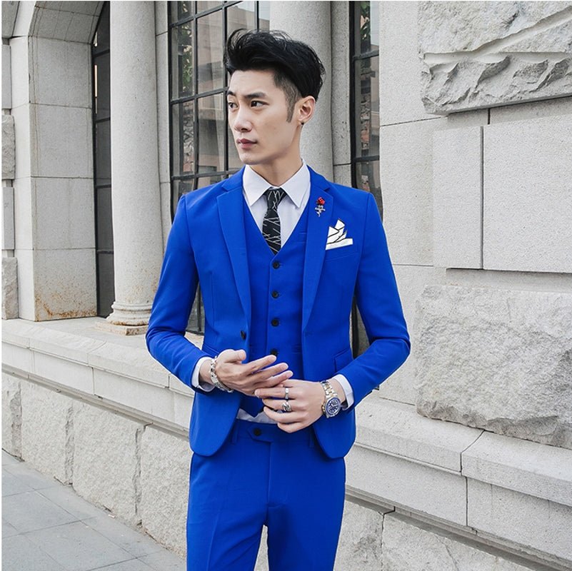 Slim-fit men's three-piece wedding suit in casual Korean style, featuring a tailored jacket, vest, and trousers with a modern look.