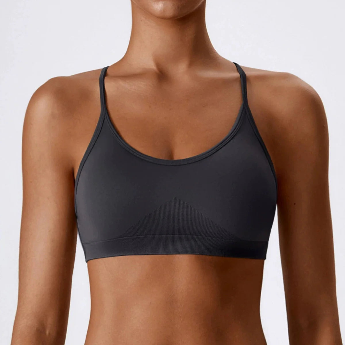 Showlu Seamless Cross Back Yoga Bra in quick-dry nylon with tight braces and a stylish back design for comfortable active wear.