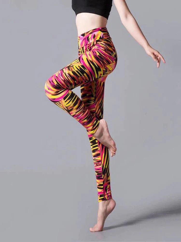 Showlu Fashion CUHAKCI women's high waist leopard print leggings, elastic sport pants for workout and fitness activities.