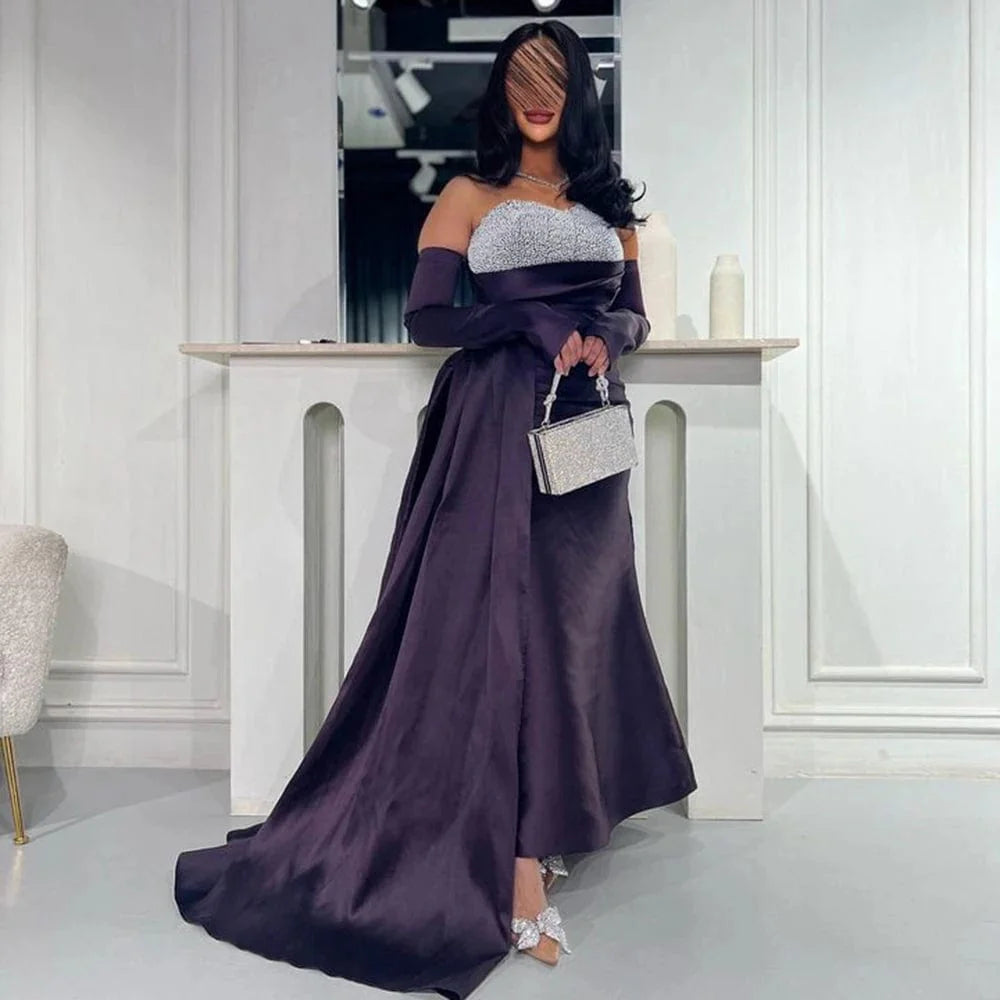 Purple A-line quinceanera dress by SHOWLU FASHION, sleeveless satin gown with sequined embellishments and pleated design.