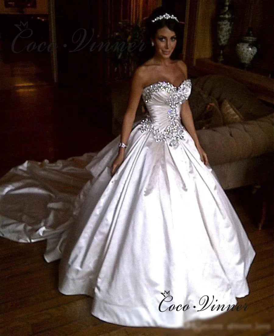Elegant satin ball gown wedding dress by SHOWLU FASHION with crystal beading, sweetheart neckline, luxurious European style.