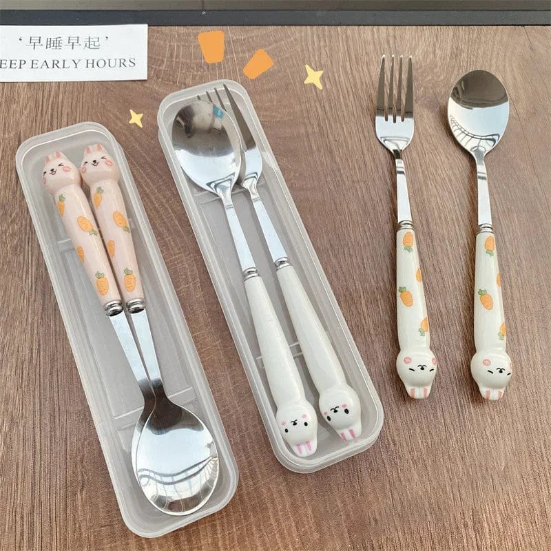 Showlu Cartoon Rabbit stainless steel cutlery set with spoon, fork, and chopsticks, ideal for travel and lunch use.