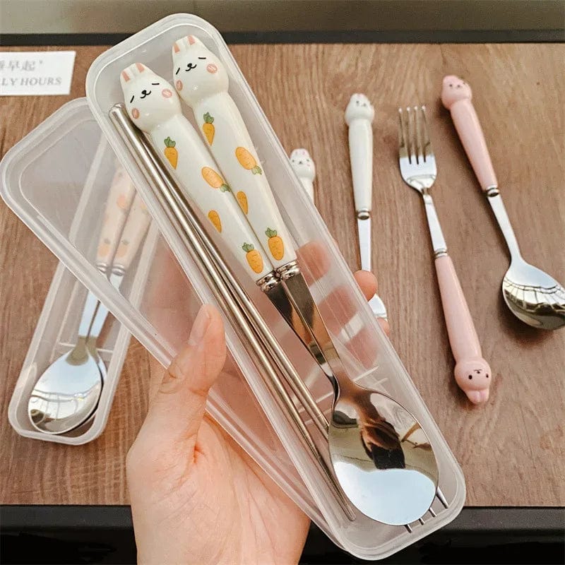 Showlu Cartoon Rabbit stainless steel cutlery set with spoon, fork, and chopsticks, ideal for travel and lunch use.