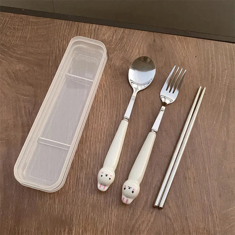 Showlu Cartoon Rabbit stainless steel cutlery set with spoon, fork, and chopsticks, ideal for travel and lunch use.