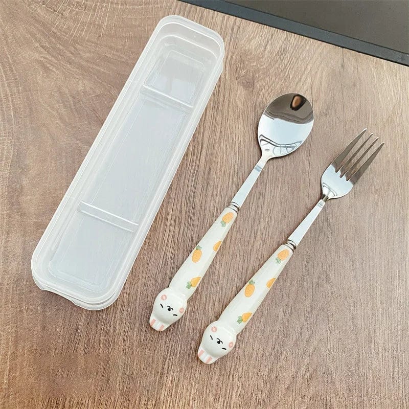 Showlu Cartoon Rabbit Cutlery Set with stainless steel spoon, fork, and chopsticks for travel and lunch use.