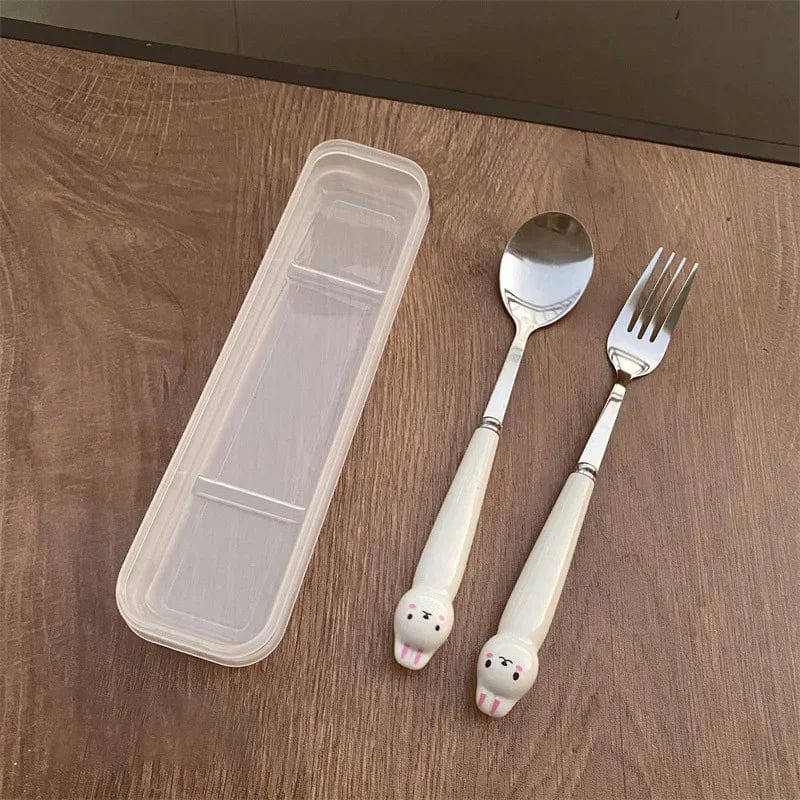 Showlu Cartoon Rabbit stainless steel cutlery set with spoon, fork, and chopsticks, ideal for travel and lunch use.