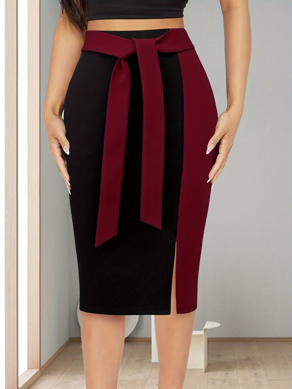 SHOWLU FASHION women's color-block midi skirt with black to burgundy ombre design, flowing fabric, and stylish silhouette.