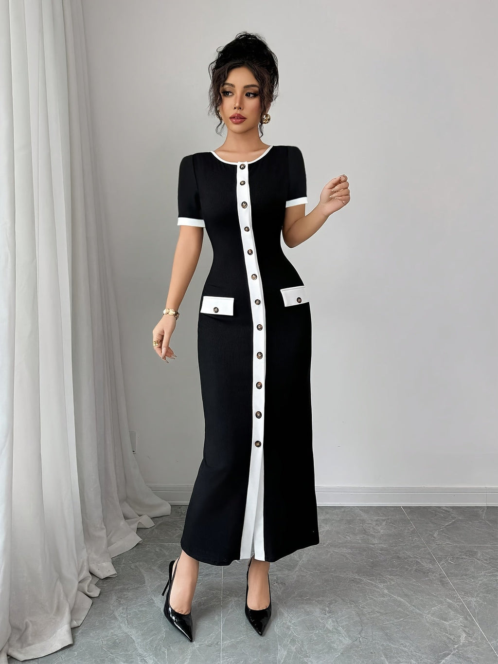 SHOWLU FASHION color block black and white A-line midi dress with crew neck, stylish and elegant for casual or formal wear.