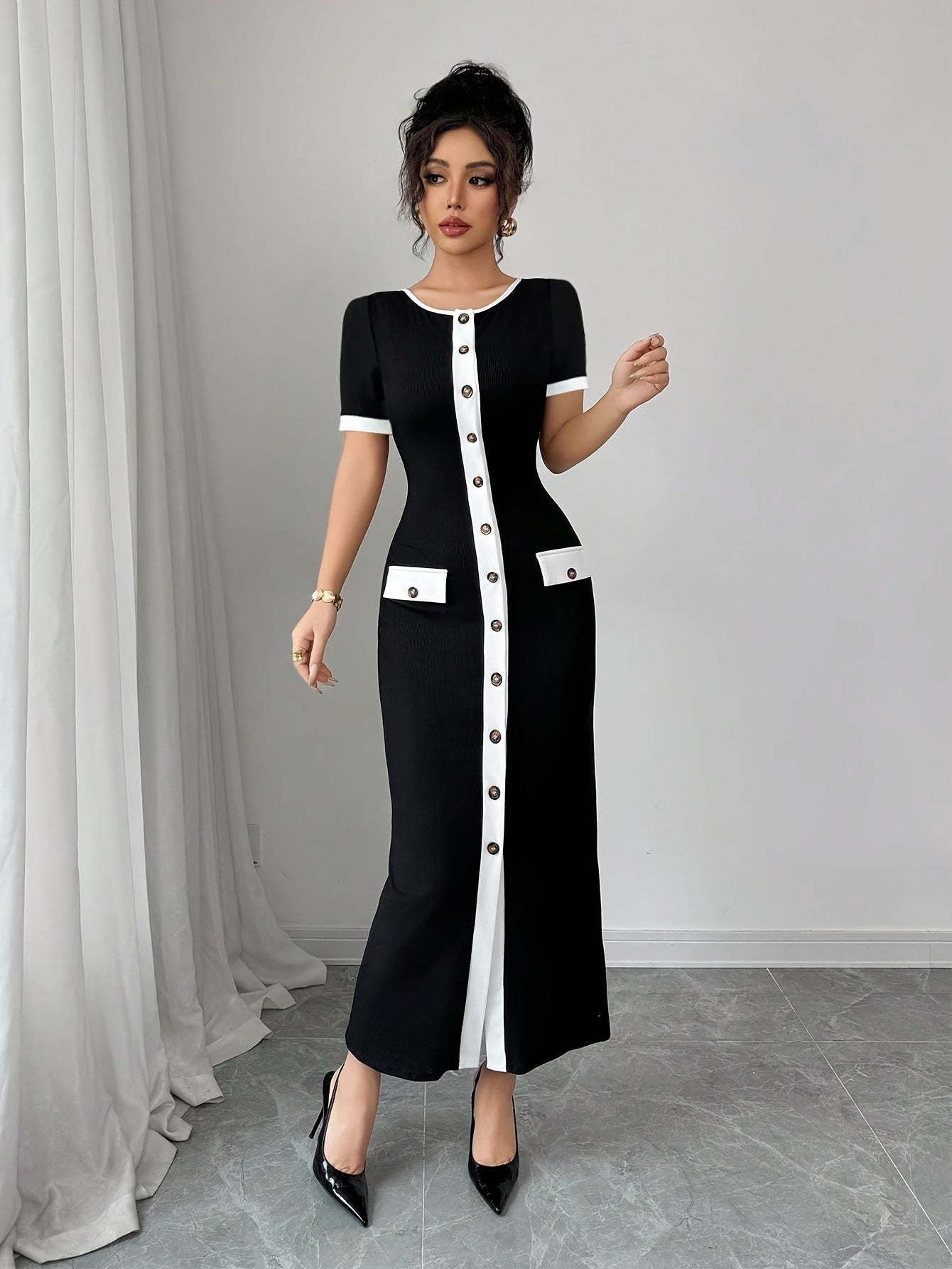 SHOWLU FASHION color block black and white A-line midi dress with crew neck, stylish and elegant for casual or formal wear.