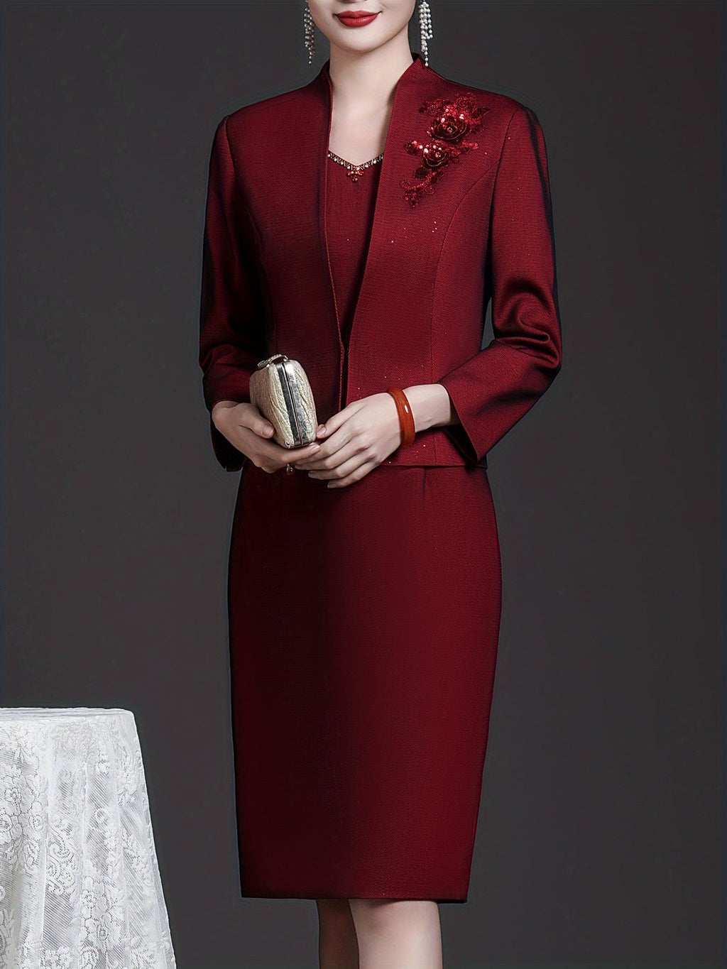 Wine red two-piece dress set by SHOWLU FASHION with floral embroidery, featuring a sundress and matching top.
