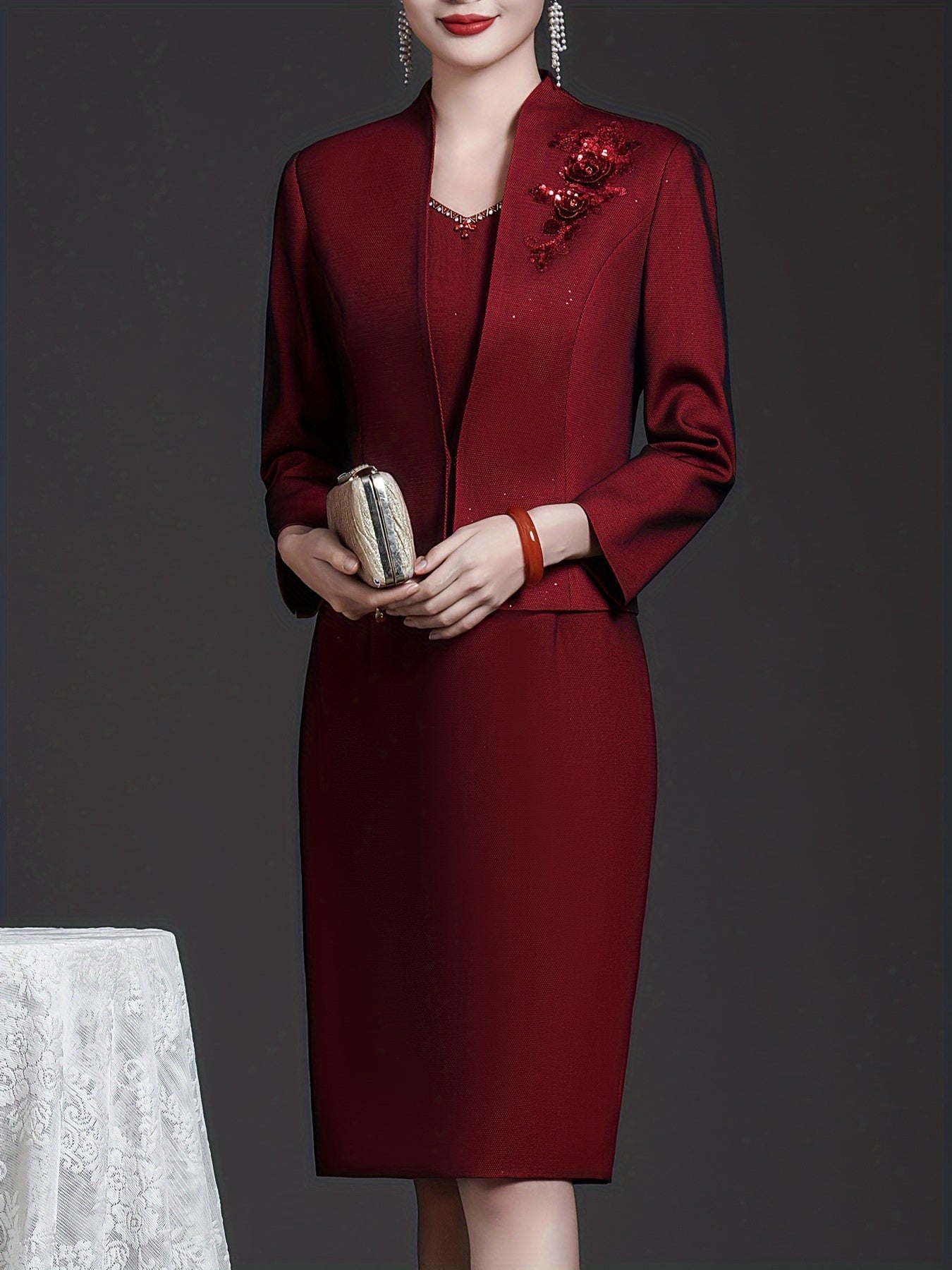 Wine red two-piece dress set by SHOWLU FASHION with floral embroidery, featuring a sundress and matching top.