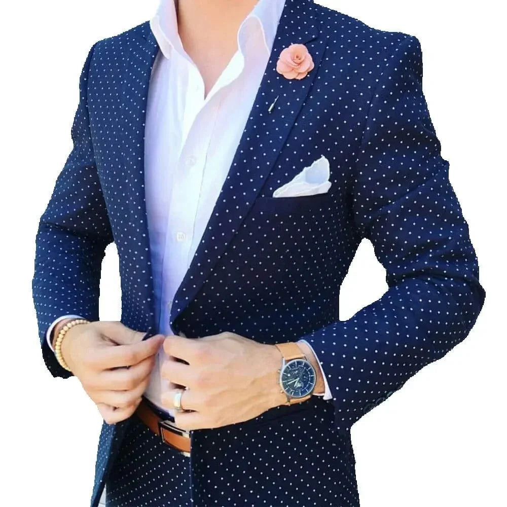 Dark blue dot men's slim fit tuxedo with peaked lapel, single button blazer and matching pants, ideal for wedding or prom attire.
