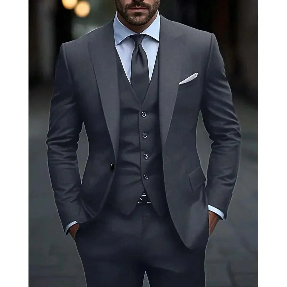 Dark grey SHOWLU men's 3-piece slim fit suit with peak lapel, featuring jacket, vest, and pants, ideal for wedding or formal events.