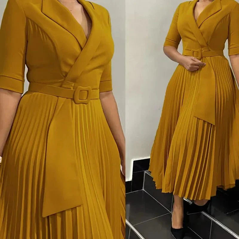 Elegant Showlu African Dashiki Dress with V-neck, pleated long skirt, half-sleeve Ankara style, suitable for autumn occasions.