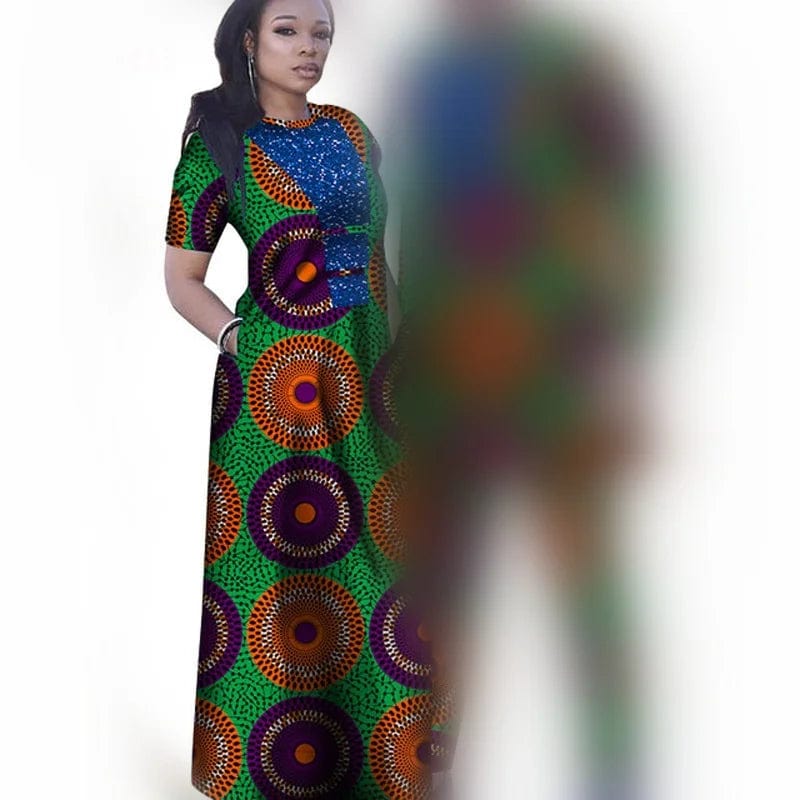 African couple outfits featuring a woman in a mermaid dashiki dress and a man in matching traditional pant set.