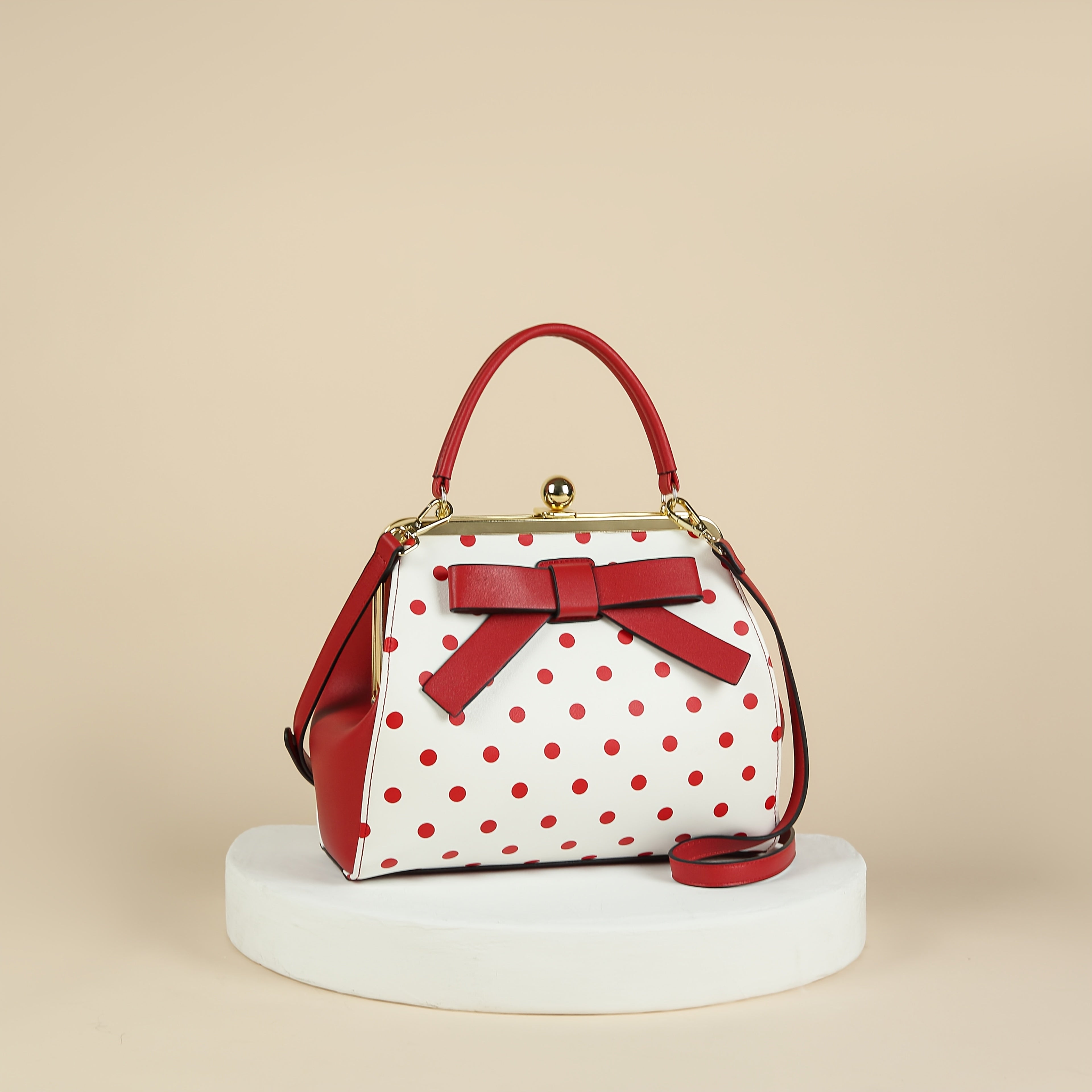 SHOWLU Polka Dot Patent Leather Handbag with Bow and Kiss Lock Closure, stylish accessory with a playful dot pattern and elegant design.