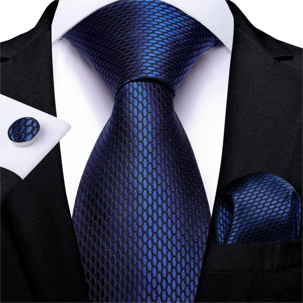 Navy blue silk tie set for men including cufflinks and pocket square, stylish and suitable for business or wedding attire.