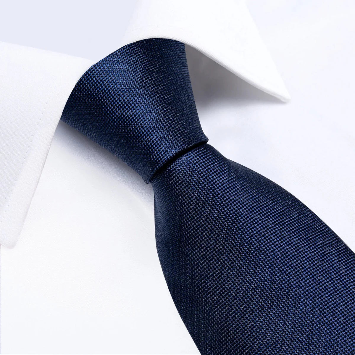 DiBanGu navy blue solid silk tie set for men featuring necktie, matching handkerchief, and cufflinks, ideal for business or formal occasions.