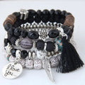 Bohemian pink crystal bead bracelet with tassel wing for women, elastic design, stylish accessory for girls and women.