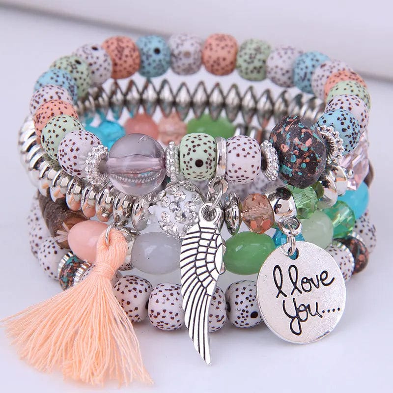 DIEZI Bohemian pink crystal beaded bracelet with tassel wing and elastic rope for women and girls, stylish boho jewelry accessory