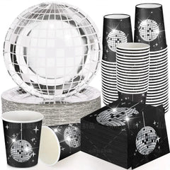 A disco ball themed party tableware set featuring silver plates, black cups, and napkins.