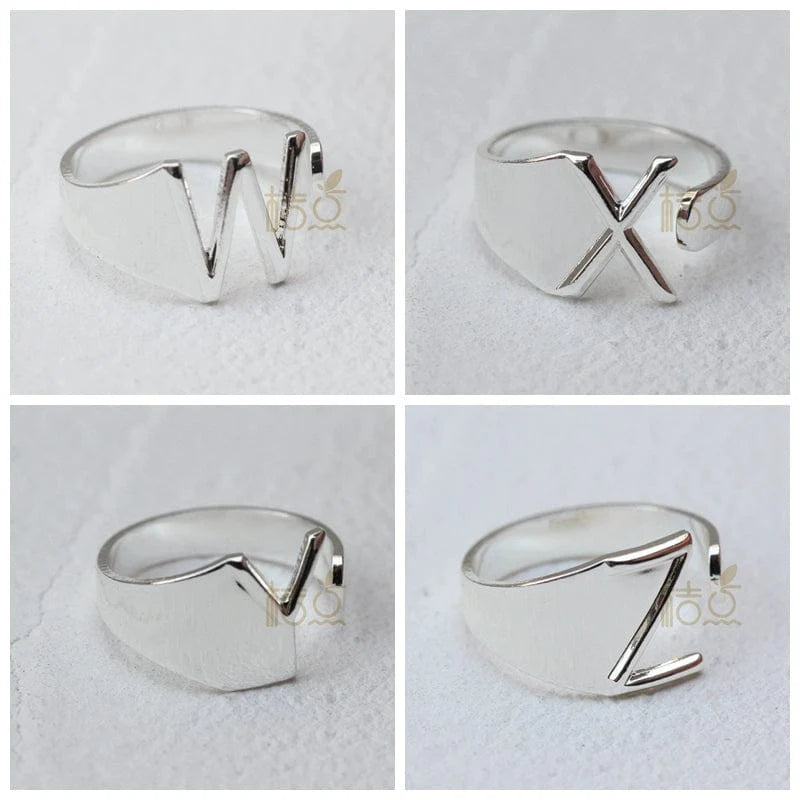 Silver plated open ring with customizable letter ornament, showcasing a delicate DIY style and adjustable fit.