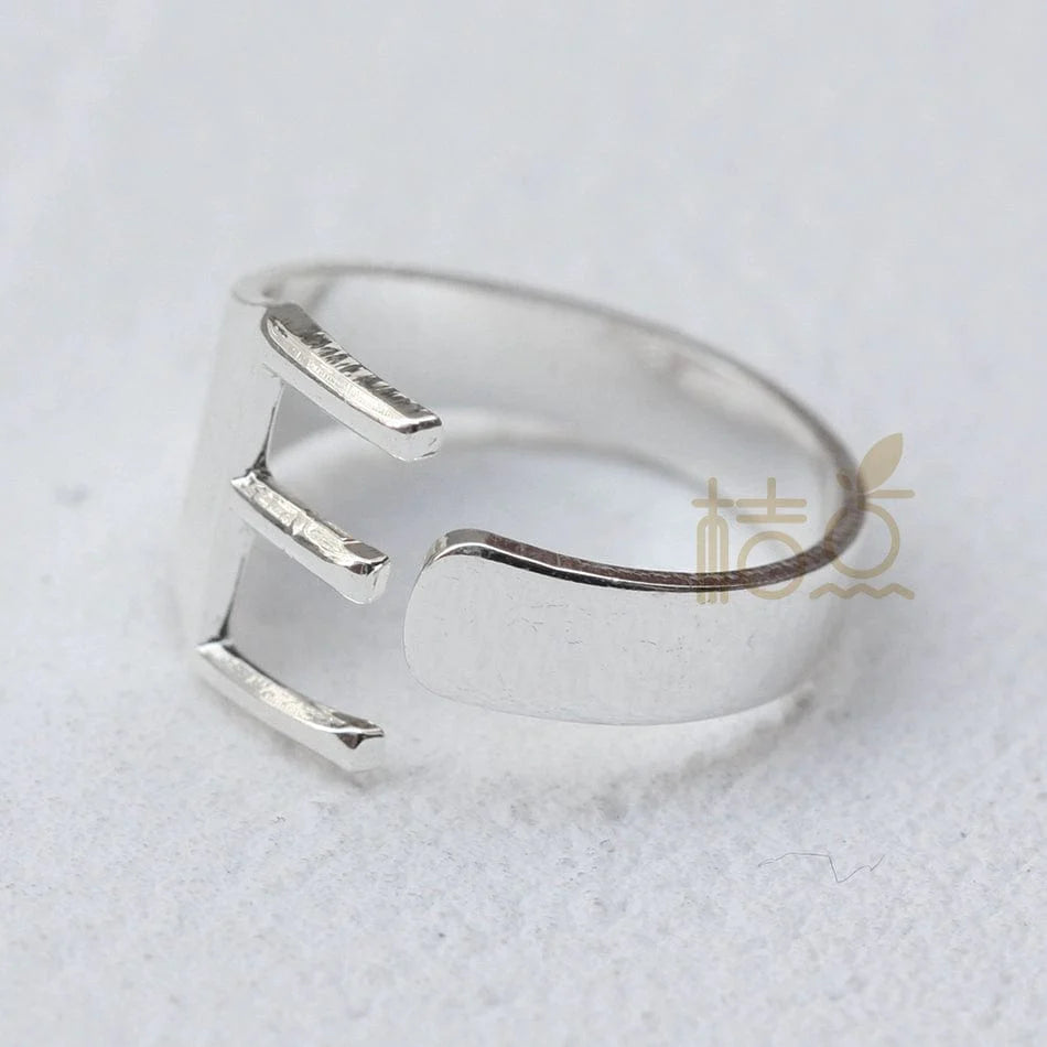 Silver plated open ring with customizable letter ornament, designed for finger wear, by Showlu Fashion Store.