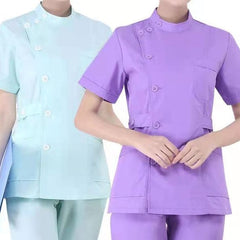 Two medical scrub sets in light blue and purple with a side-buttoned tunic design.