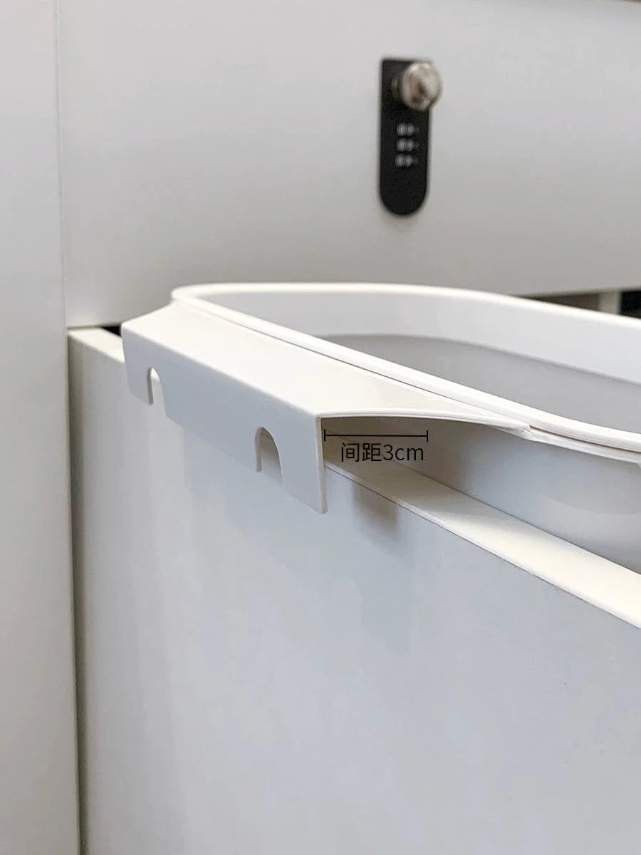 Wall-mounted Donha 4L plastic kitchen trash can from Showlu Fashion Store, hanging on a cabinet door for convenient waste disposal.