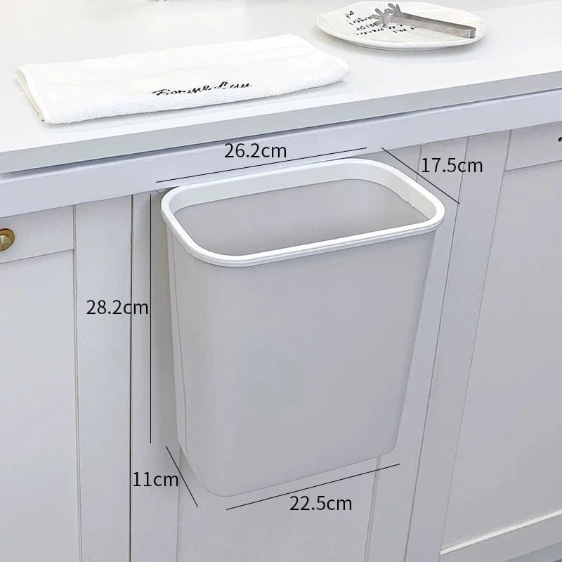 Donha wall-mounted kitchen trash can in white plastic, 4L capacity, hanging design for kitchen or living room storage.